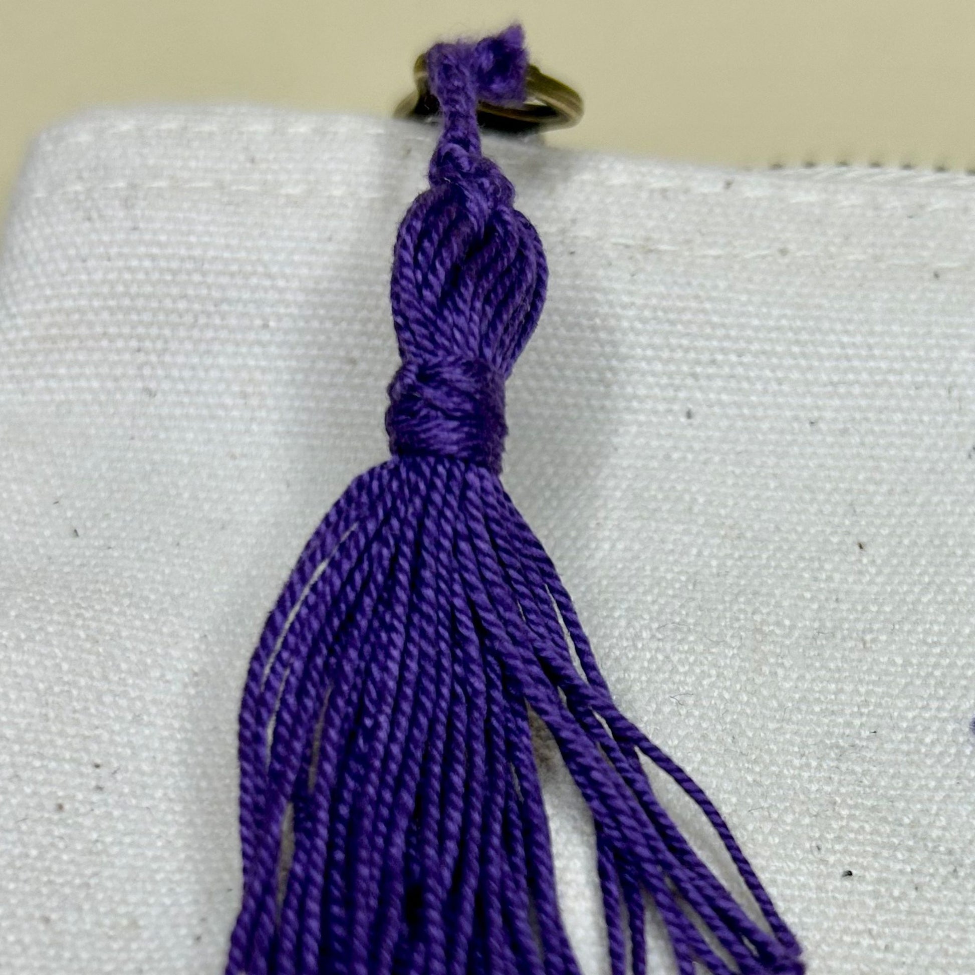 Pochette ricamata farfalla viola