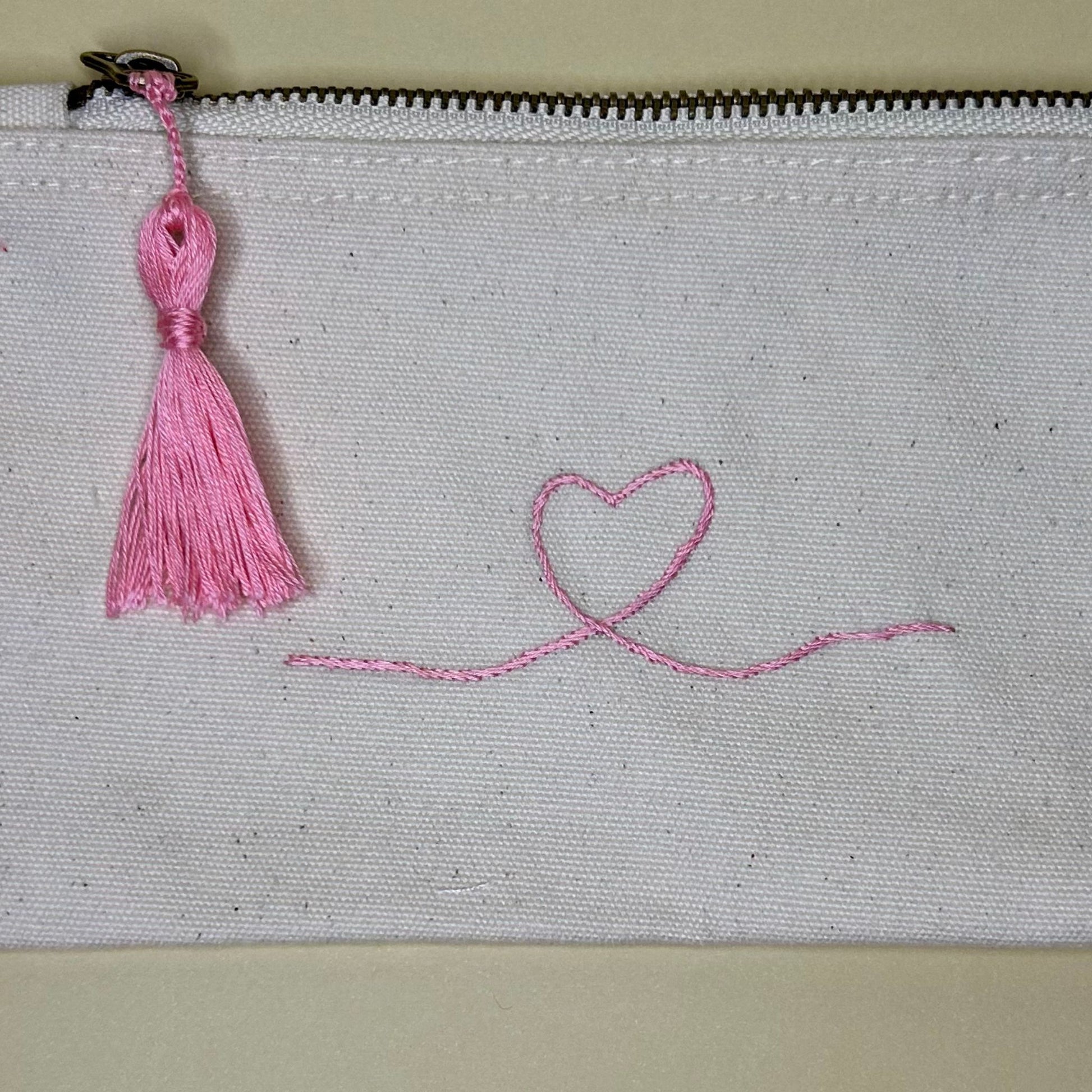 Pochette ricamata cuore rosa