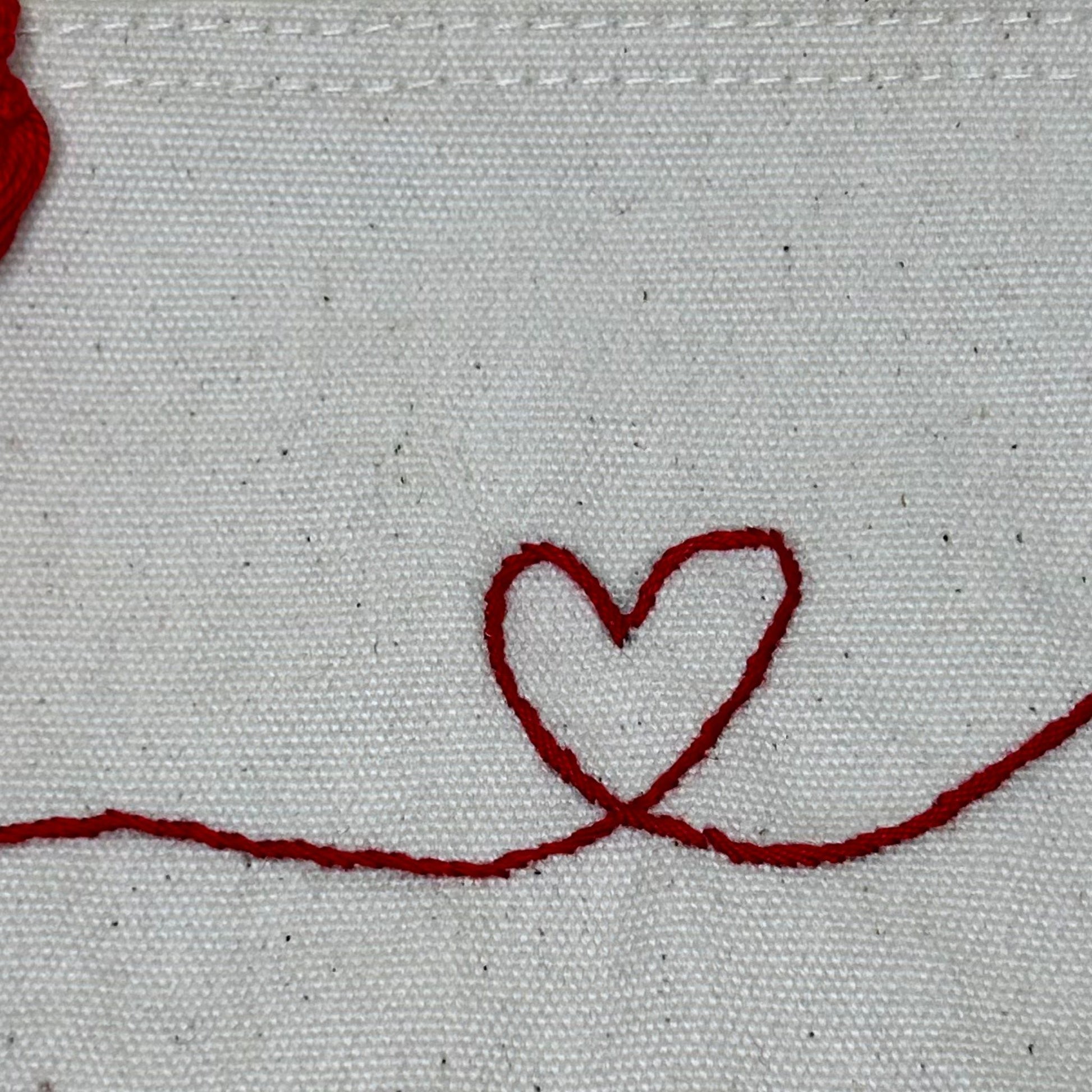 Pochette ricamata cuore rosso